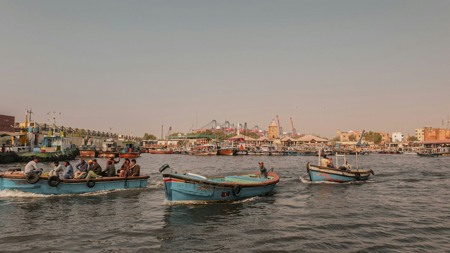 Photo by <a href="https://unsplash.com/@kashu555?utm_content=creditCopyText&utm_medium=referral&utm_source=unsplash">Kashif Afridi</a> on <a href="https://unsplash.com/photos/a-group-of-people-on-small-boats-in-the-water-7cmukABh8-Y?utm_content=creditCopyText&utm_medium=referral&utm_source=unsplash">Unsplash</a>   